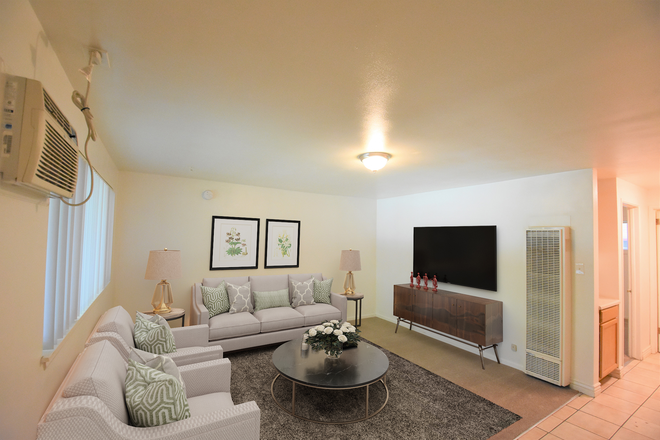 living room (staged photo, does not come furnished) - 2955 E. College Ave. (1BR/ 1BA) Apartments