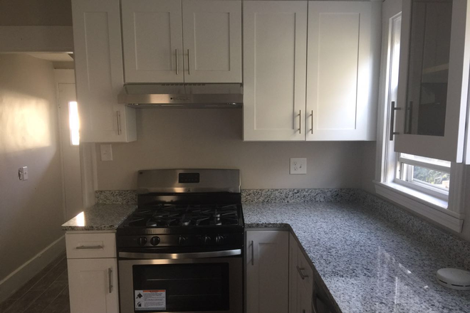 Eat-in Kitchen - Must See: large 3-4 BR Condo in Desirable Neighborhood Close to Tufts