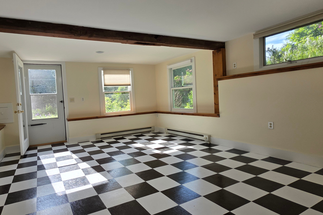 living room - Central Amherst Apartment in single family home  on  quiet street.