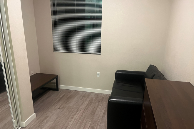 Living room space - The Suites at NAU Apartments