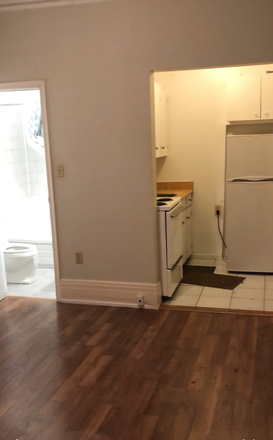 looking from main room to kitchen and bath - Bright Bachelor Studio in Historic Forest Hill Home