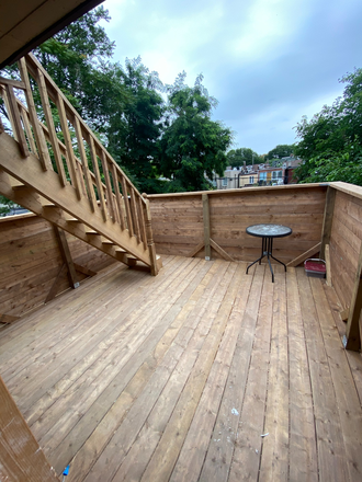 deck 1 of 2 - Gorgeous newly renovated 4 or 5 bedroom 2 washroom unit at Bloor+Bathurst Apartments