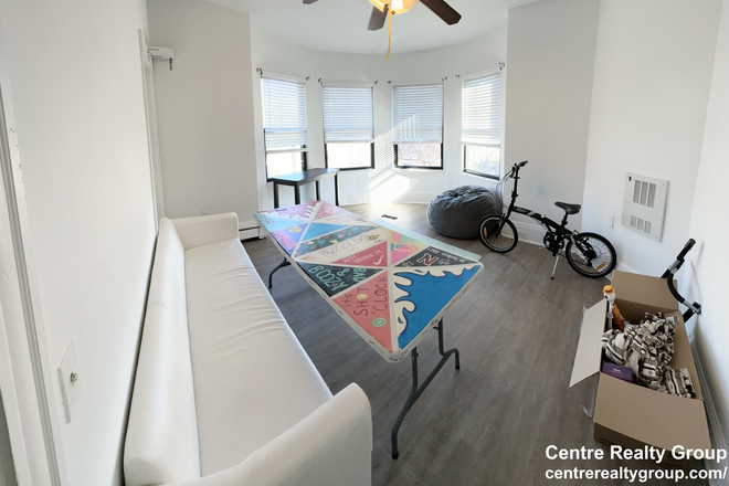 Bedroom - 4 bedroom on Tremont St. w/ tons of natural sunlight & laundry in unit Apartments
