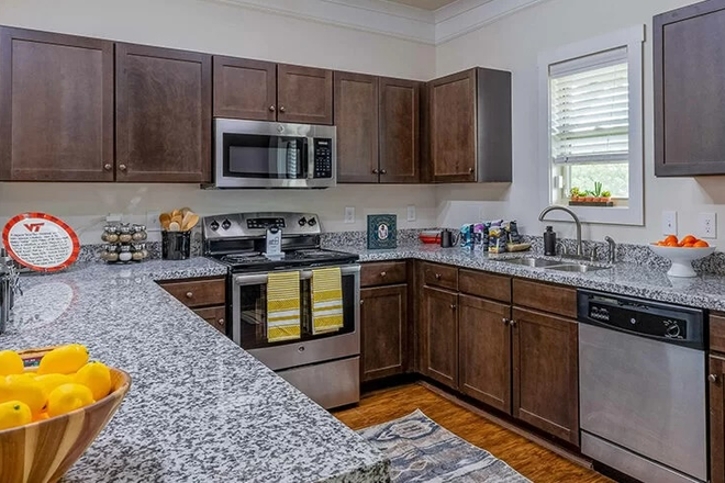 Photo of kitchen - Spr'26 Sublease Room Available at Brexx/Retreat Townhome