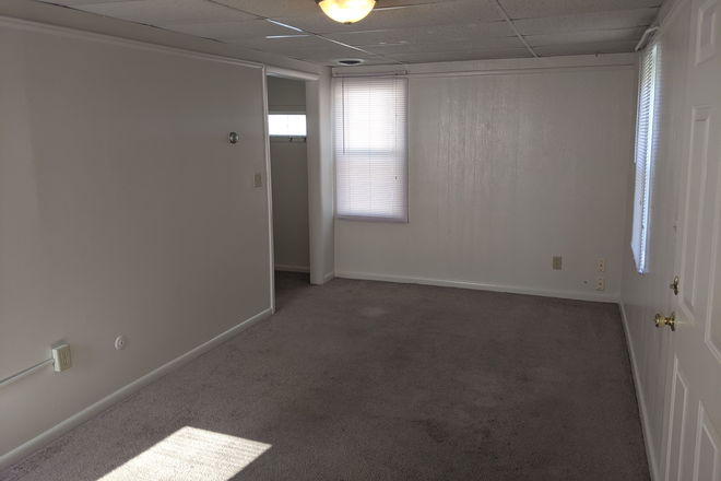 Living Room - 101 West Vine Street Apartments