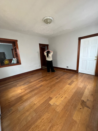 Living room, has a two pantry into the kitchen - 2 Bedroom 10 minute drive to Campus Apartments