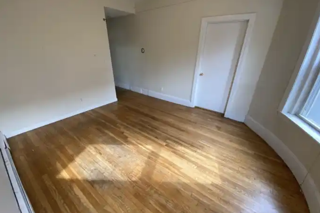 living room - LOCATION!! 2 Bed / 1 Bath w/ Heat and Hot Water included available 3/1/24!! Apartments