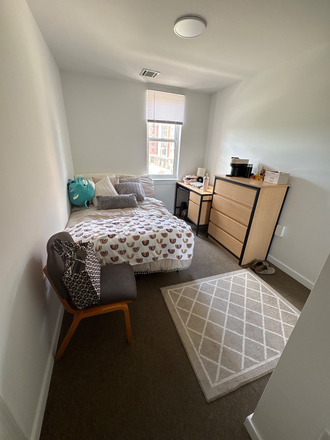 Bedroom, and there are mirrors on the closet! - South Campus Commons Apartments