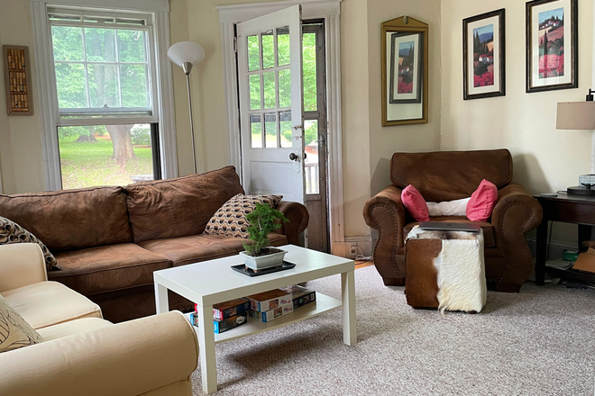 Living room - Driveway parking. Great location. Better rent! :) Duplex