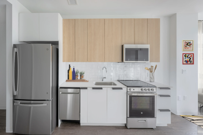 kitchen - TWO MONTHS FREE! 1 Bed Near Campus! UTILITIES INCLUDED! LAUNDRY IN UNIT! Apartments