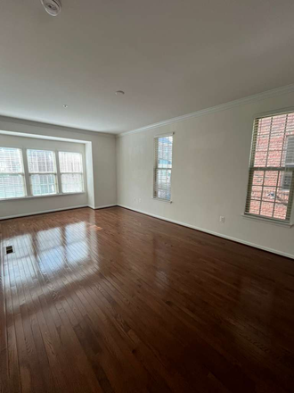upper level main living room - Luxury New Construction + Private Garage - Steps from Johns Hopkins  Hospital Townhome