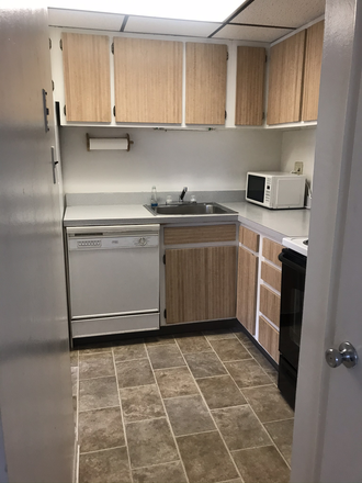 1st floor: kitchen - RAMSGATE TWO BEDROOM END UNIT TOWNHOME  (D43) AVAILABE IN AUGUST