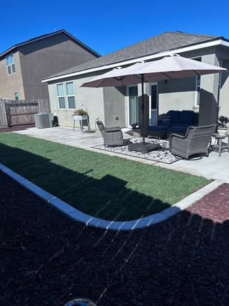 Backyard - New House!  6.6 miles to the UC!!