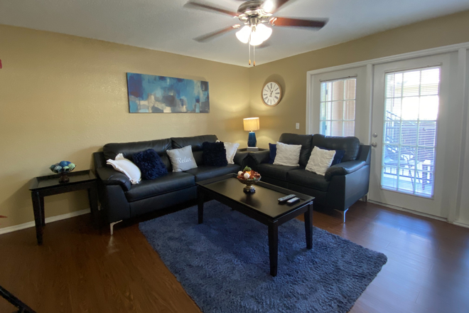 Living area - Boardwalk at Alafaya Trail - 2025-2026 Leasing Term Apartments