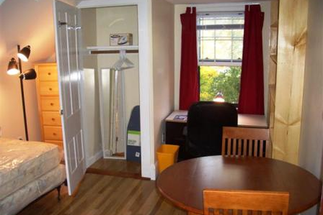 bedroom with desk,dining tabe,closet - 27 William St Apartments