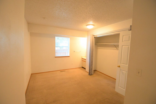Bedroom, This is an old photo and it is hardwood floors now. - House on Marine st