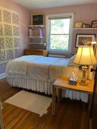 Second-floor bedroom with a view to the garden.0000000000000 - Furnished 2nd floor unit, w/ kitchenette, private bathroom, natural light. Women only. Steps to bus House