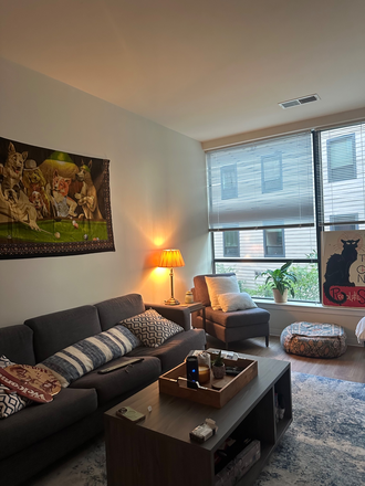 Living room with furniture and TV - Terrapin Row Apartments