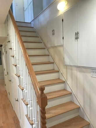 Stair case from the upper level to the lower level - Townhouse,5beds 4 baths, 2Parking, Inman, Central, walk to MIT, yard