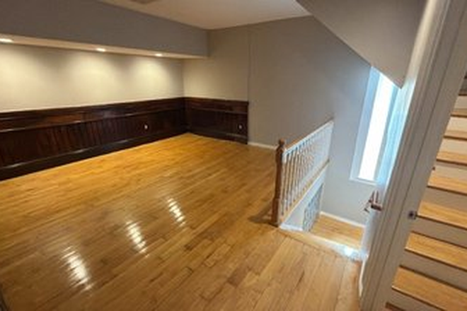 Living Area - Updated Condo w/ 3 Floors | 2 Beds + Office, 2 Full Baths, Exposed Brick, Central Air & Charm