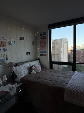 Bedroom - Fully Furnished Lightview Apartment with a City-View, Gym, Laundry & more!