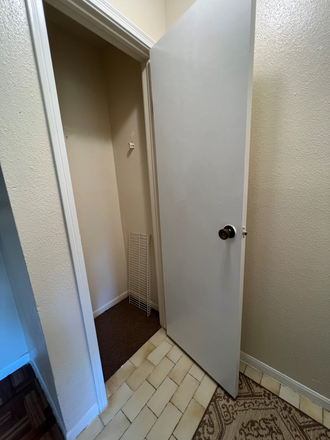 Coat closet (Entry) - One bedroom condo close to Med Ctr, Rice U