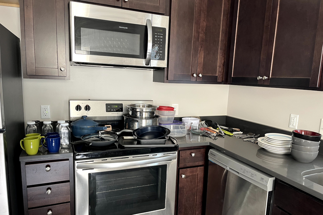 kitchen with kitchenware included (if desired) - Solora Properties Studio Apt