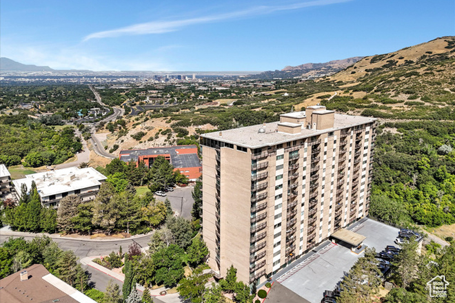 Building Exterior & Grounds - Furnished 1BR Condo with Mountain Views on 7th Floor | Covered Parking | Pool & Gym