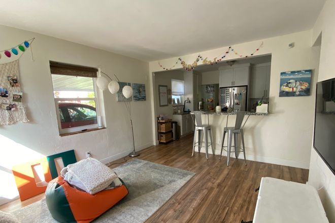 Living Room (#1) - WALK TO UM!! Walk to Metro/Sunset!! 6521 SW 59TH AVE-  New kitchen/bathrooms, fenced yard, pets ok!! House