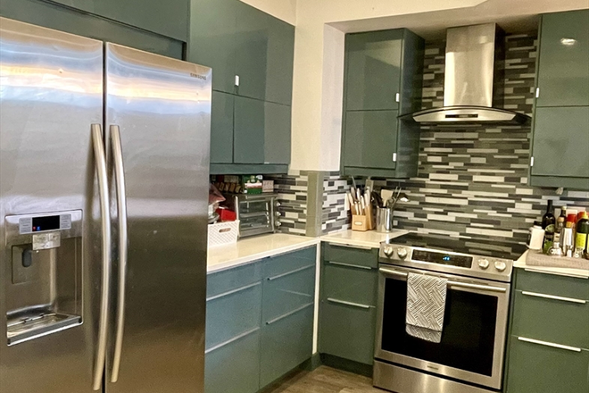 living - SPACIOUS BRIGHT 4 BED/2 BATH WITH IN-UNIT LAUNDRY AND WATER/SEWER INCLUDED! 9/1/26!