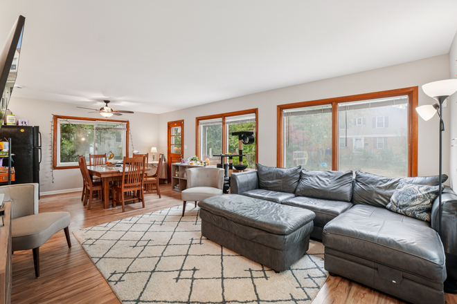 Living area - 5000 Quebec St (College Park, MD) Apartments