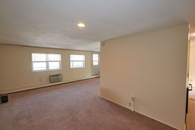 2-bedroom living room - Riviera Apartments - Freshly Remodeled August 2025**