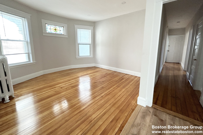 Living Room - Updated 4 Bedroom for September $3,400 near Public Transportation Apartments