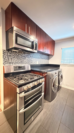 Kitchen - Modern 2BR / 1BA Apartment – All Utilities Included – Garage + In-Unit Laundry
