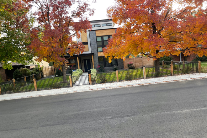 Outside view of the house in the fall - Fully Furn. 2 bed 1 Bath Basement Apartment w/Garage Space $2,750 per Mon. Incl. all Util