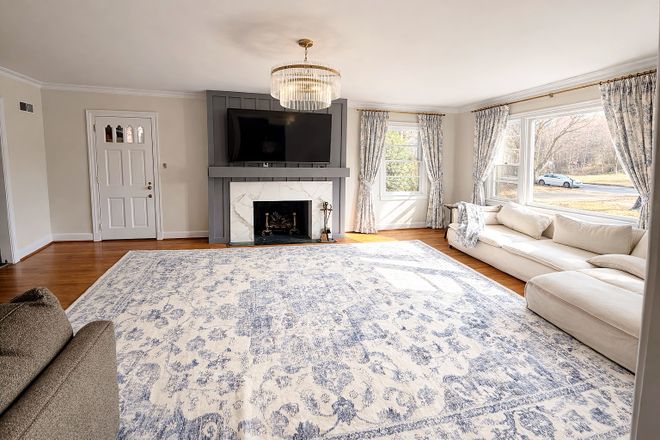 living room - Executive Furnished 4BR Home on 2 Private Acres | 10+ Parking | Near Duke & RTP