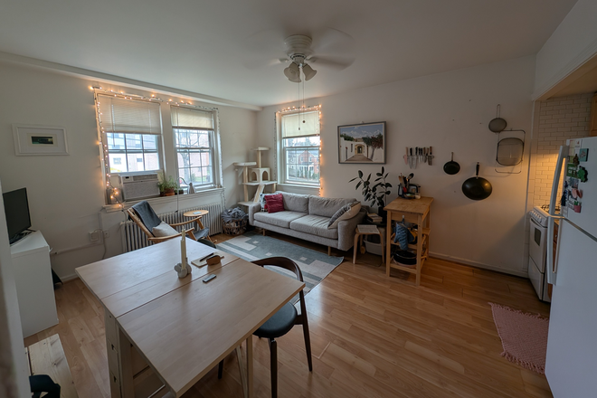 Common area - includes living room (with TV), dining area, and kitchen. All furnishings are mine but can be replaced if you have your own. - Quaint Block in the Neighborhood Apartments