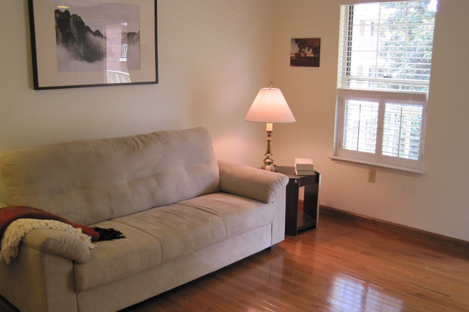 living room - Furnished 2 bdrm/1.5 bath townhouse in quiet complex