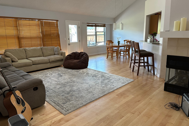 Main level furnishings from stairs - $100 OFF SEPT '25 RENT! $765/MO EACH BR (INCLUDES UTILITIES/TRASH). House