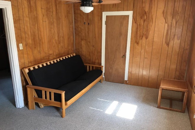 LR - Spacious, four room, one bed apartment in Historic Victorian Home