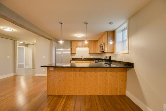 spacious kitchen w breakfast bar - 1626 Carroll Ave huge 4 BR, 2 BA, Apartments