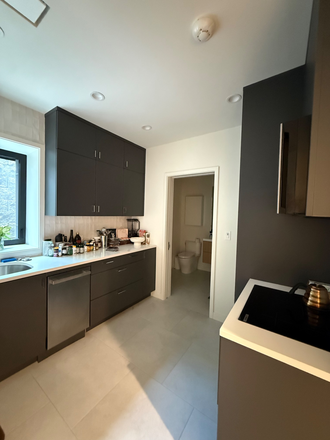 Kitchen (leading to bathroom) - July-Sept Start: Bright New 1BR off Brattle St/ West Cambridge - Brand New, All-Inclusive Apartments
