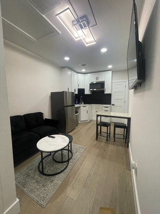 Dining Room - Stove and Dishwasher has been installed - BRAND NEW FURNISHED GARAGE APARTMENT WITH 2 BEDROOMS 1 BATH. WALK TO RICE, UTMB, MEDICAL CENTER