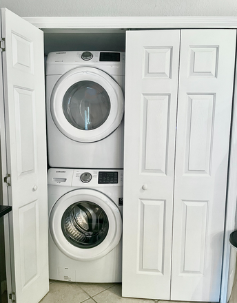 Laundry System - Bright, Cozy & Pristine Retreat in Morningside | Near Emory | Pool | Parking Condo