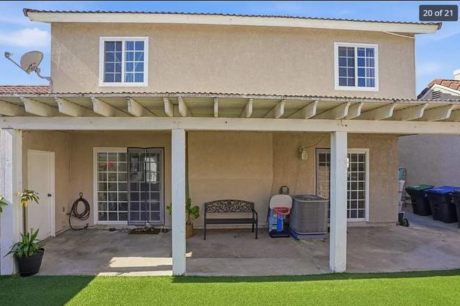 Backyard - In a two-story home, I rent two bedrooms, master bedroom for $1,500 and the other room for $1,300