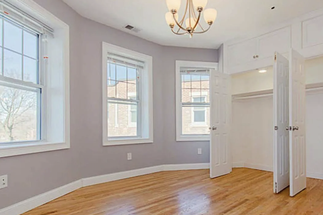 Bedroom with full wall of closets. The room will come fully furnished. - Brookline Summer Sublet Apartments