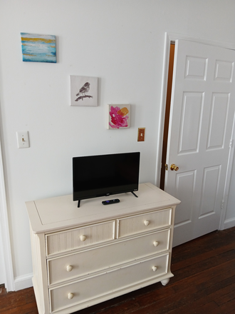 Dresser w/ Roku TV with lovely paintings! - $875-PRIVATE-LARGE-STUDIO- Furnished STUDIO -$875-w/ Kitchenette Area & Private Bathroom in a House