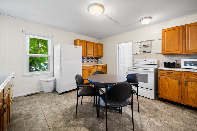 Kitchen & Dining Area (Building 6) - Eagle Court Apartments (ALL UTILITIES/FURNITURE INCLUDED)