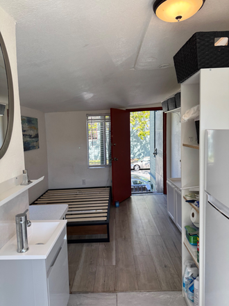 Master Suite with a full size bed - A furnished clean/sunny  small studio (1.6 miles away from UCB)