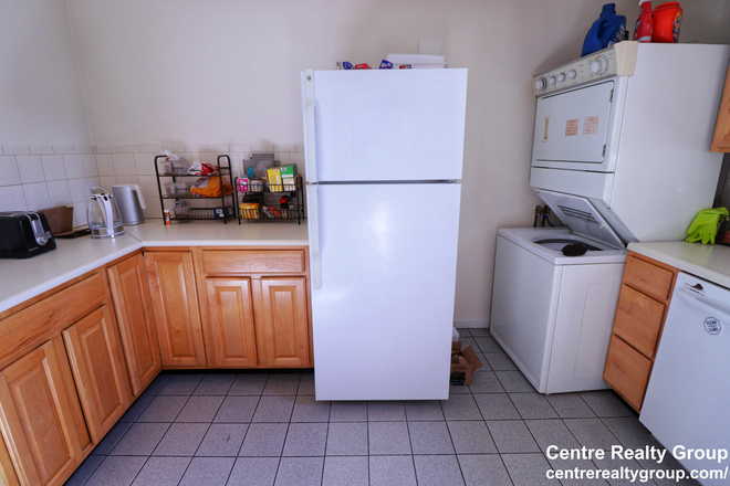 Kitchen - Spacious 2-Bed apartment with in unit Laundry!